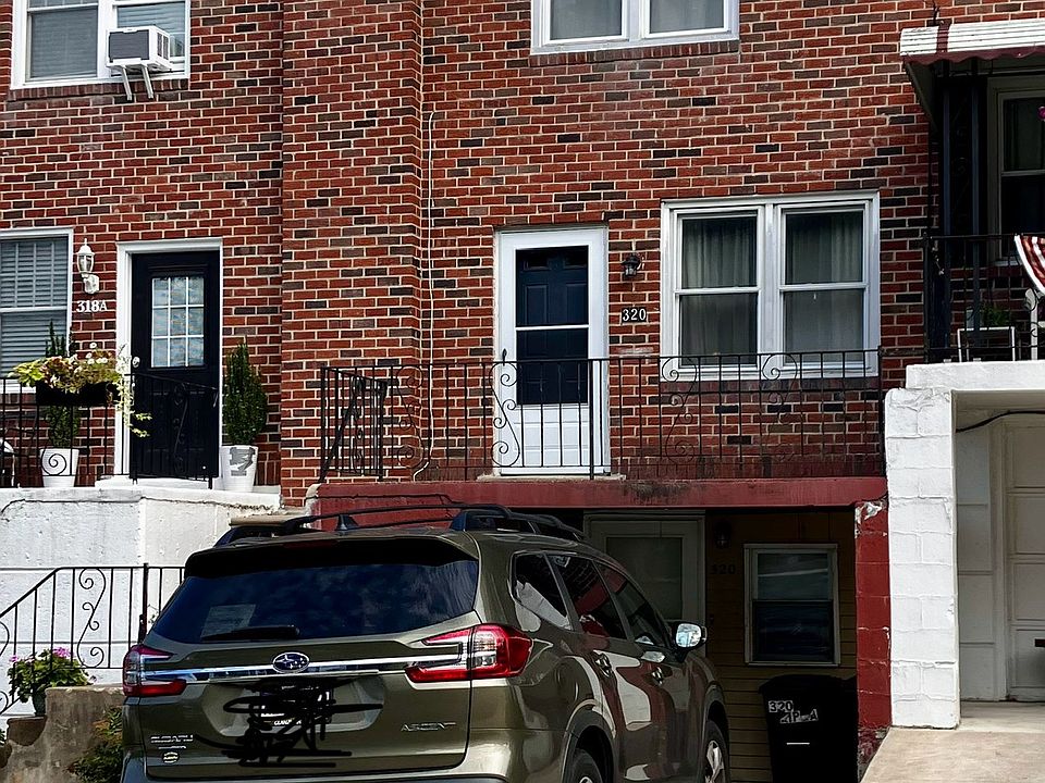 Front w/porch and driveway