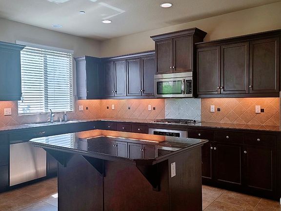 Large kitchen with plenty of storage with big pantry