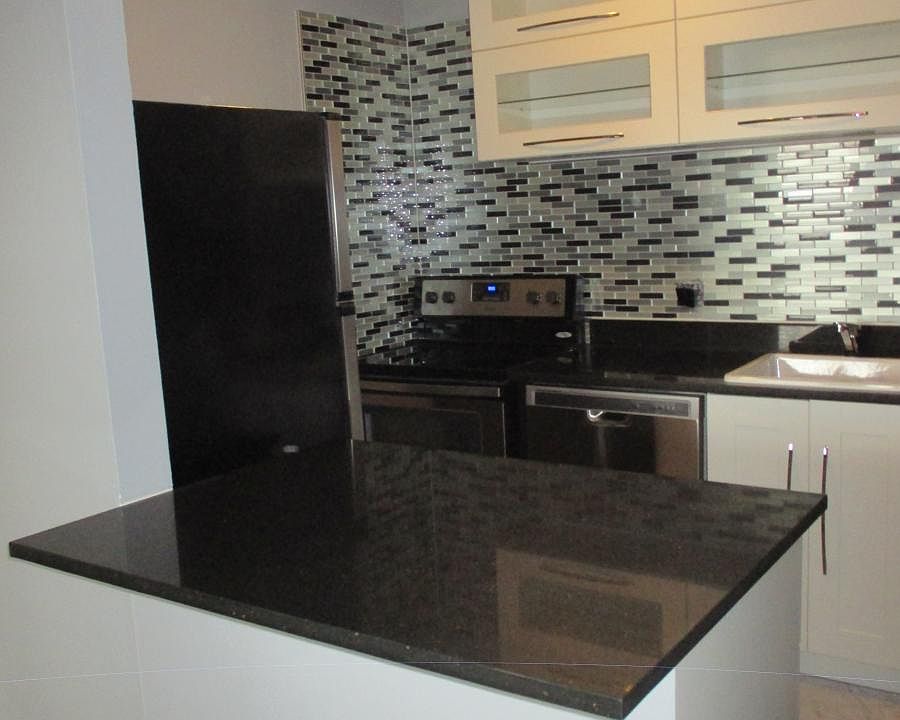 Inside kitchen with new back splash