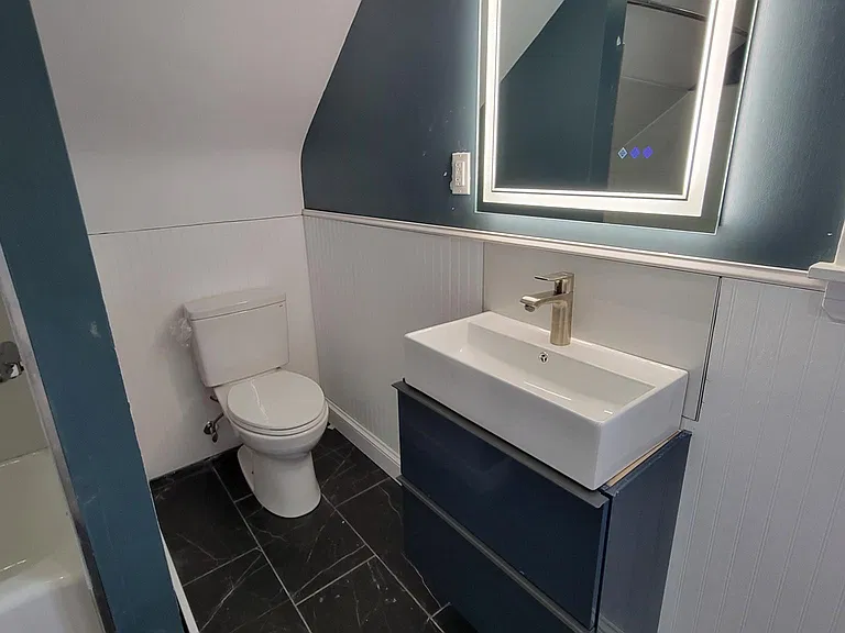 Fog free heated mirror with light.