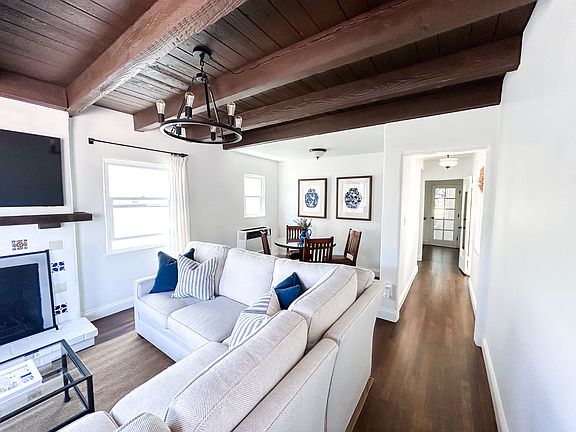 Hallway leading to kitchen, bedrooms & bath