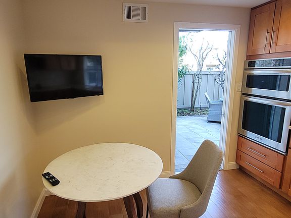 Kitchen:
Stove and Microvewe
TV and Stone top table
Entrance to patio