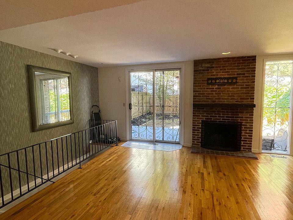 Left stairway to finished basement with laundry room, storage, laundry area and inside entry to garage. Back sliding door leads to private backyard.