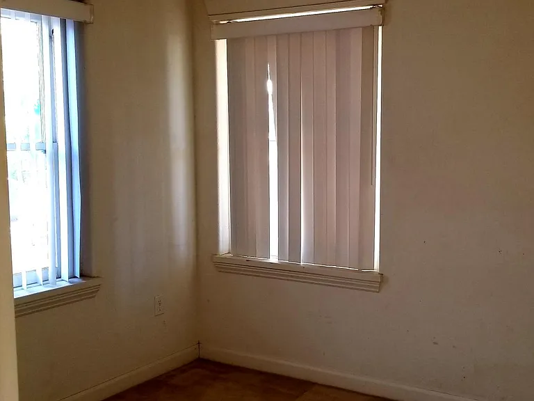 Guest Bedroom. faux wood blinds. (Updated Photos Coming Soon).