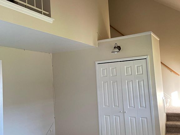 Vaulted ceilings and large windows provide a light airy living space.