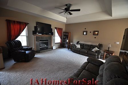 Great Room - features tray ceiling and gas fireplace