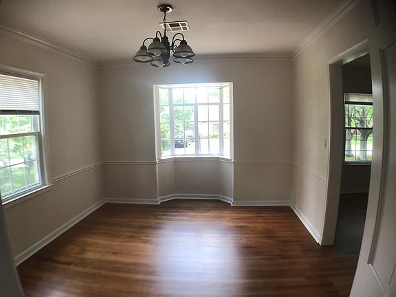 dining room with bay window