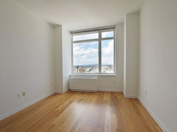 2nd image of 61-55 Junction Blvd #16H