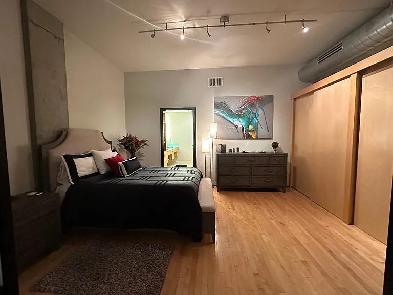 Large Primary bedroom with two large double door closets and onsuite primary bath