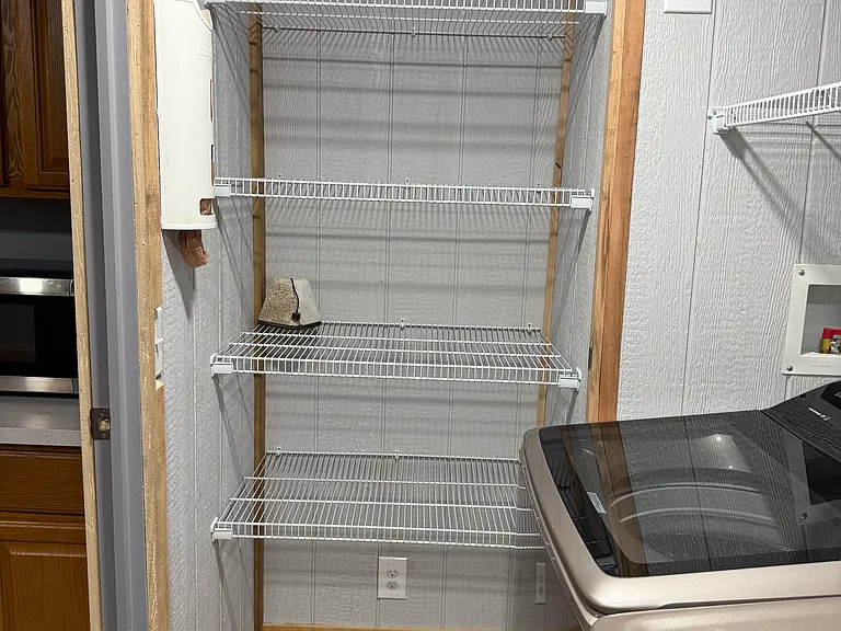 Laundry room storage shelves