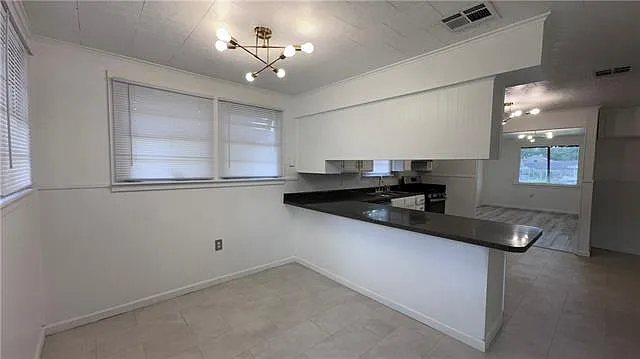 921 Gaudet Dr — Photo 10