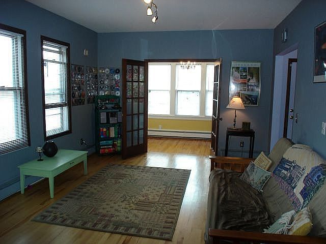 Facing south; living room & sun room