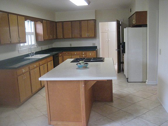 Enter the kitchen from your screen porch