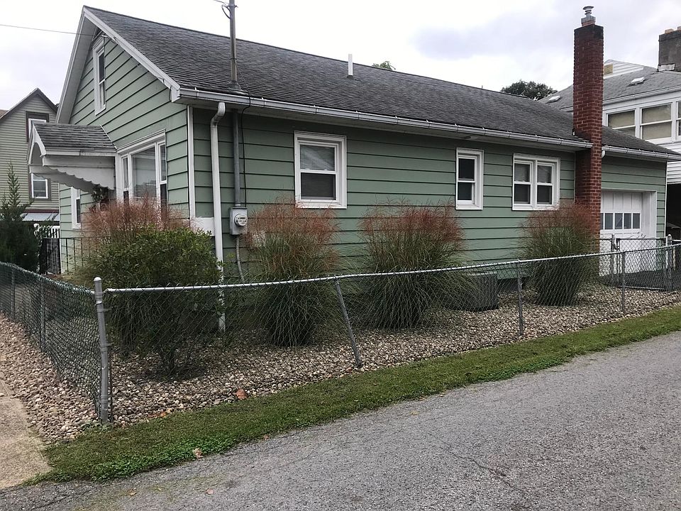 Exterior showing the attached garage.
