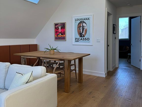 There's abundant natural light throughout the space. The iving room & kitchen are on the second floor, along with the master bedroom and bathroom.