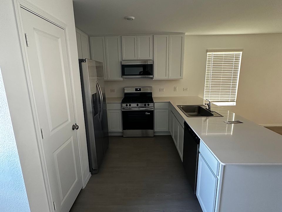 Kitchen w/ Stainless steel appliances