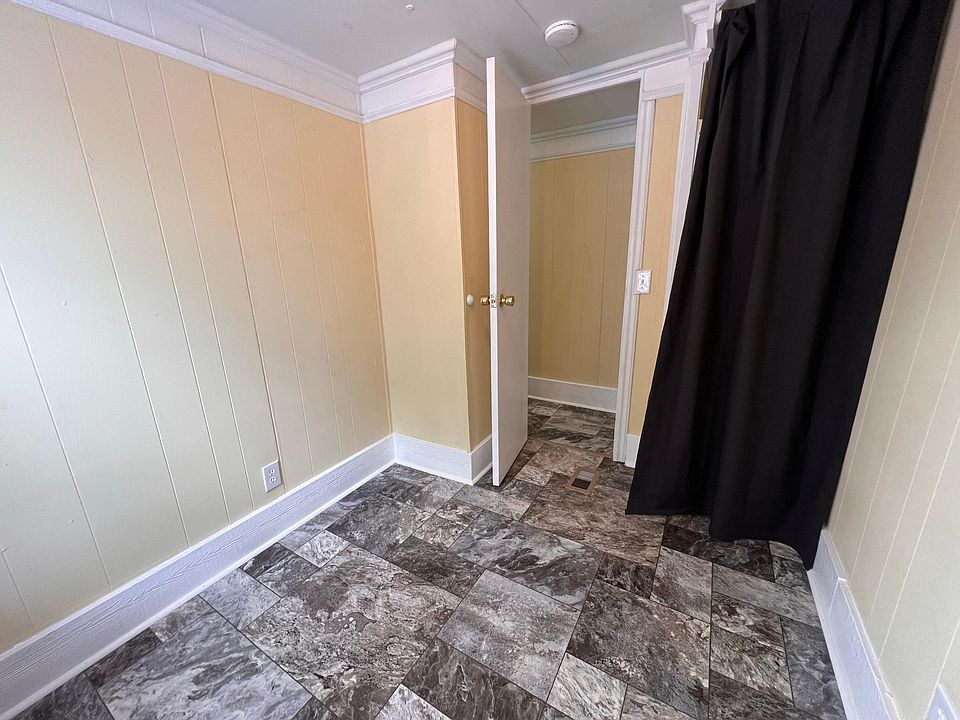 This is the first bedroom. It has a closet and a good amount of room.