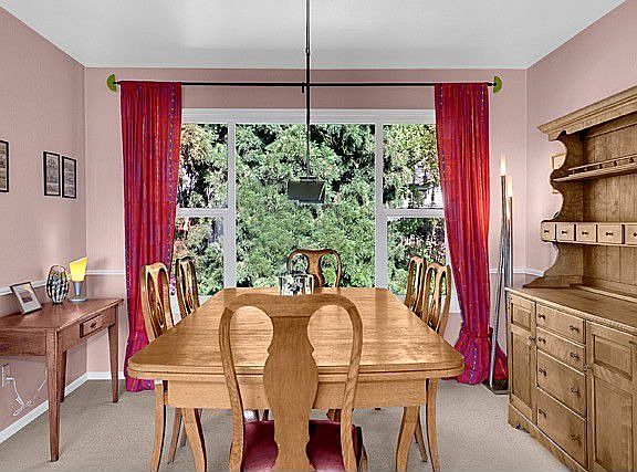 Dining room adjacent to living room.