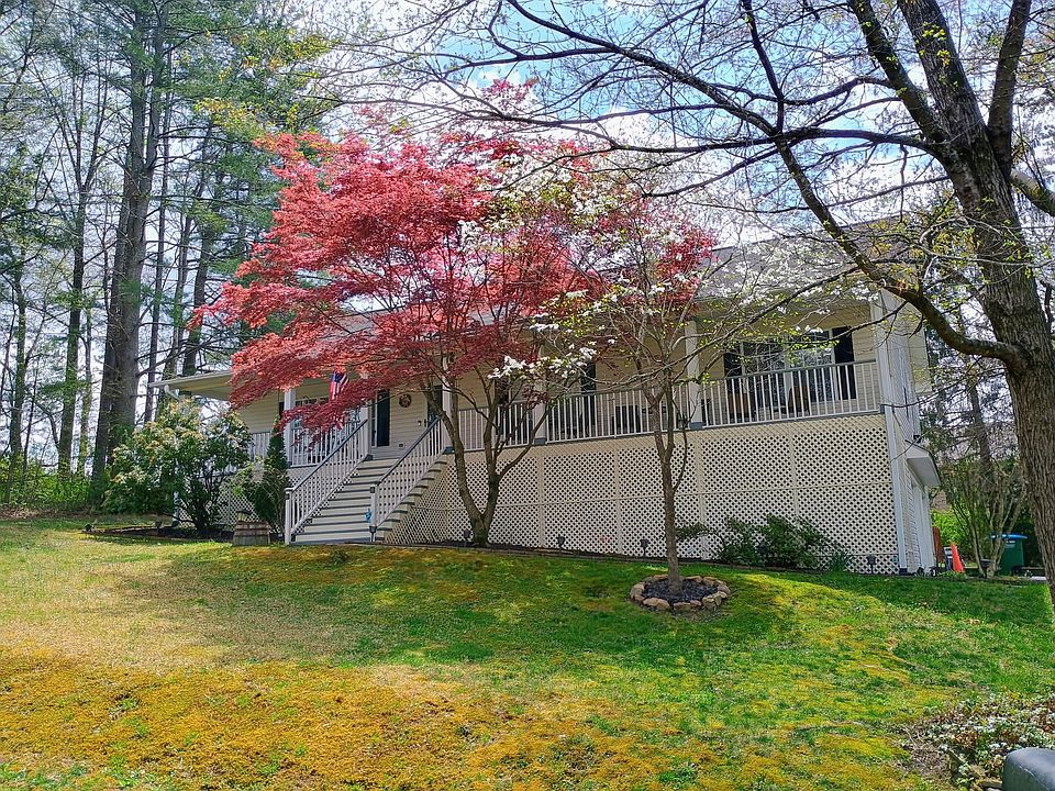 View of the front of the house and cozy porch during springtime.