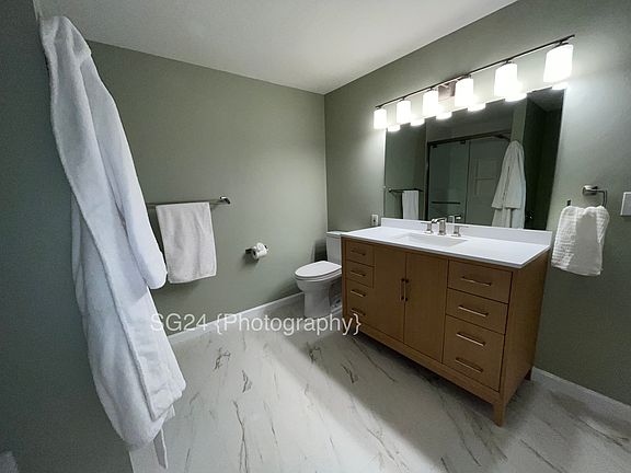 Upper floor bathroom with spa-like setting