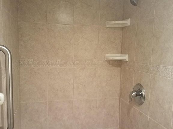 NEWLY TILED MASTER SHOWER