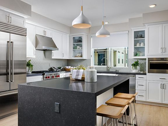 An image of the Kitchen in the Plan 4 model home at Magnolia in Arcadia.