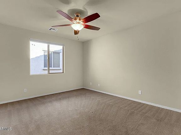 Upstairs Bedroom with walk in closet.