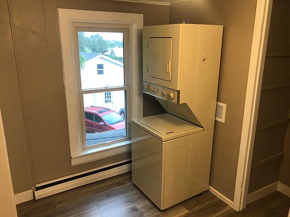 Washer and dryer unit in bathroom
