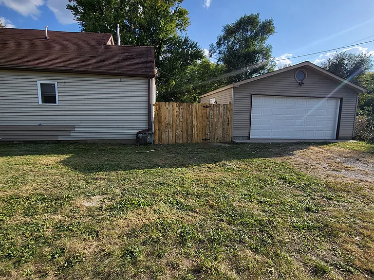 Gated Fence with Garage