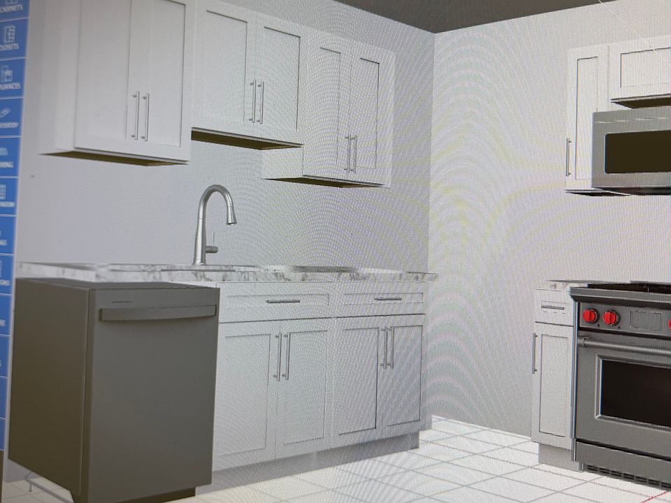 New kitchen with stainless appliances and quartz countertops under construction.