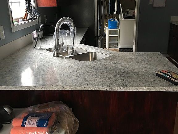 Kitchen and separated laundr