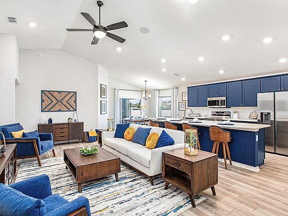 Enjoy an open living area, ideal for gathering with family and friends - Parker home plan by Highlan