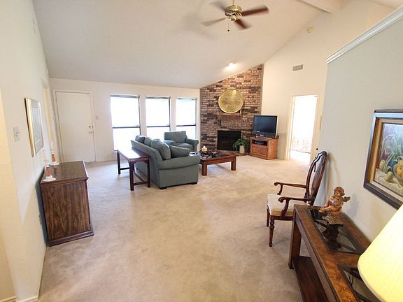 Living room with vaulted ceiling