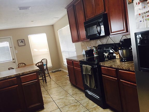 Kitchen Looking into Breakfast Area