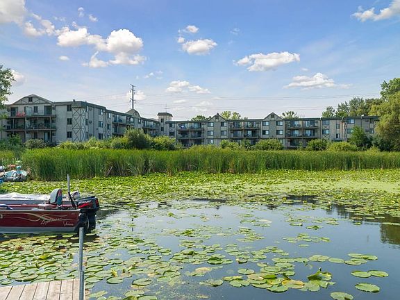 The property is on the Medicine Lake! Short walk to the beach, dock for a boat, space storage for kayaks.