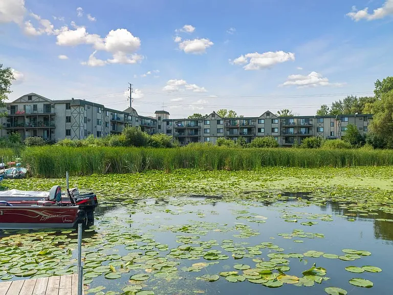 The property is on the Medicine Lake! Short walk to the beach, dock for a boat, space storage for kayaks.