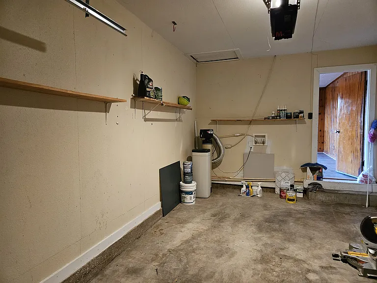 Garage with water softener and washer and dryer hookup