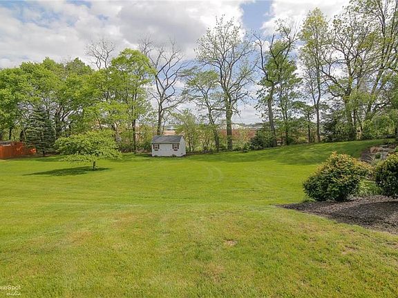 One acre lot with storage shed