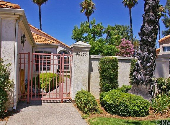Courtyard Entry with Wrap around yard. No Rear Neighbors!