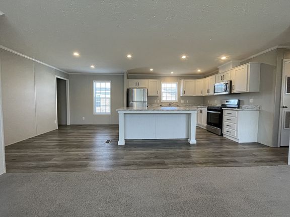 2nd image of 7204 E Grand River Ave #489