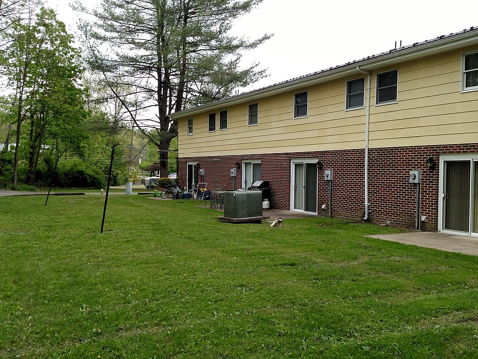 Concrete slab patio area for each unit