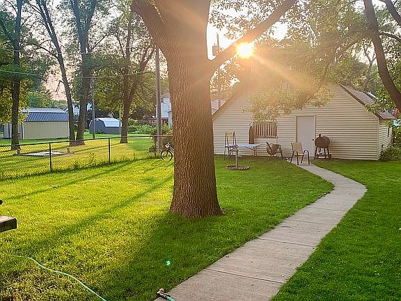 Back yard with 2 car garage