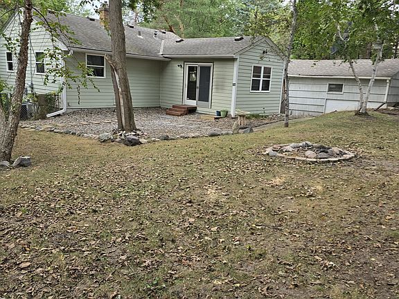 Rear of house, fenced yard