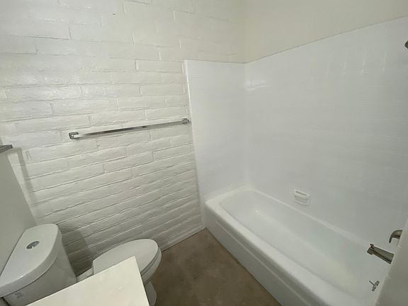 Bathroom #1 - double sink, tub/shower, linen closet