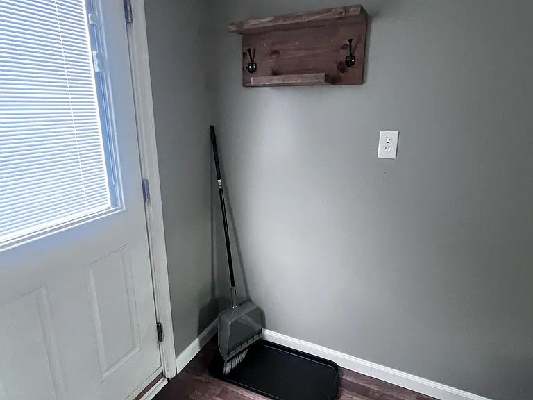 Entryway - basic cleaning supplies provided