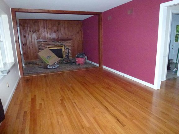 Living Room- Brick Floor, Wood Burning Fire Place