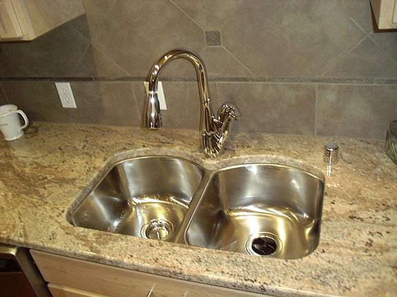 granite counter tops and stainless steel sink