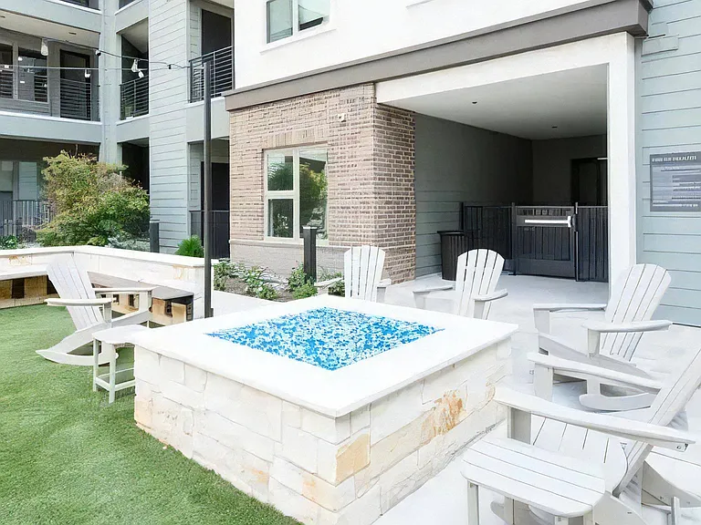 Private Courtyard Featuring Fire Pit and Lounge Seating