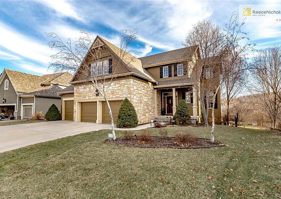 Welcome Home to this beautiful, custom home with hospitable front porch!