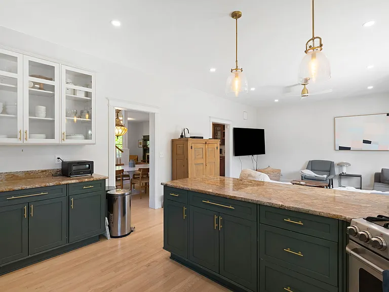 View From Kitchen into Family Sitting Area - Granite Countertops